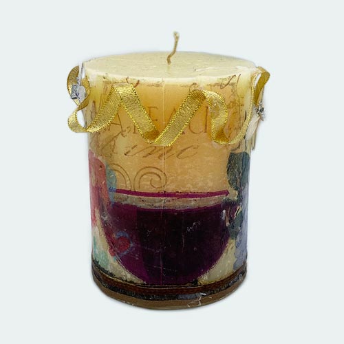 A decoupage candle