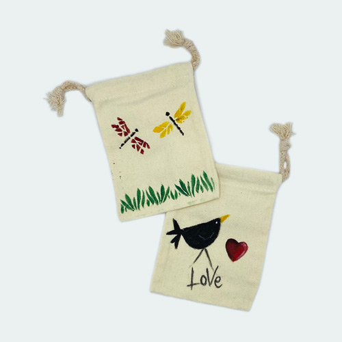 A hand-decorated drawstring pouch