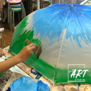 Student handicraft of a hand-painted umbrella