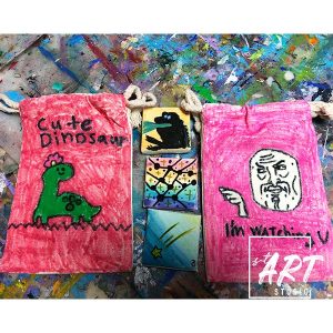 Student handicraft of a decorated drawstring pouch