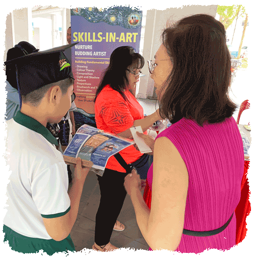 The stART Studio booth sharing its art programs with families at the Edusave ceremony