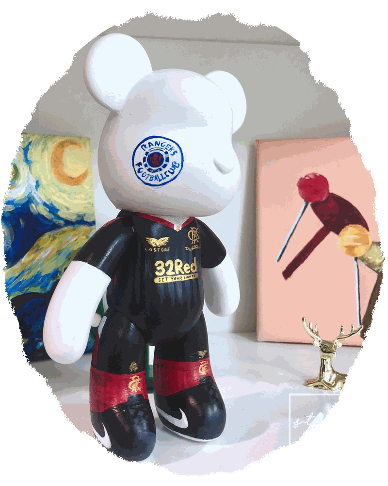 A hand-painted bear figurine created at a drop-in session