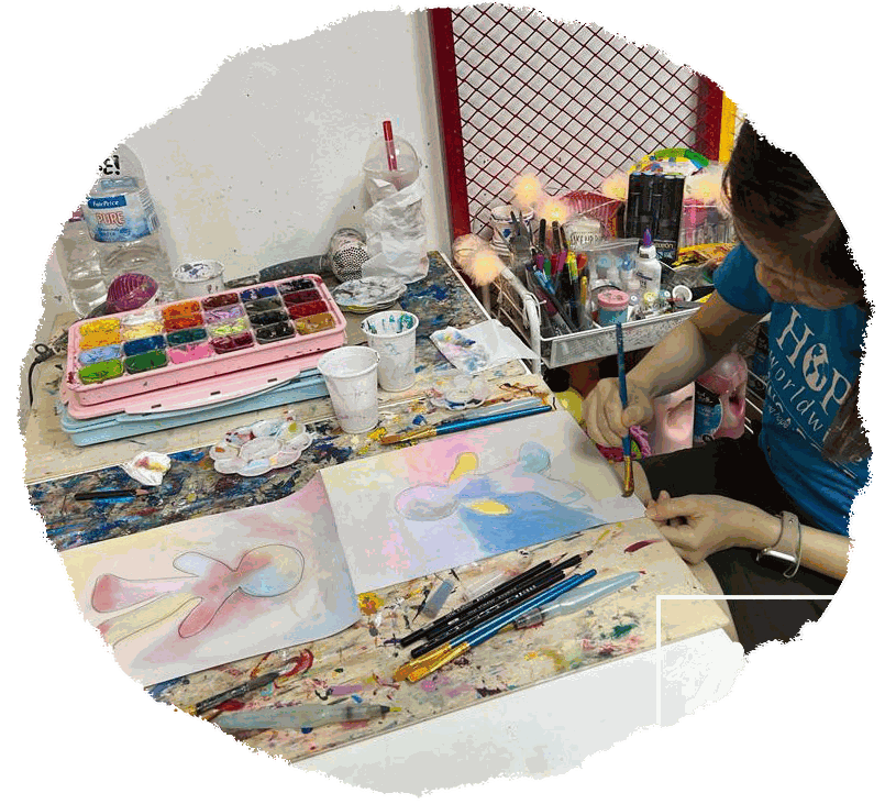A child painting freely during a Growth-ART session